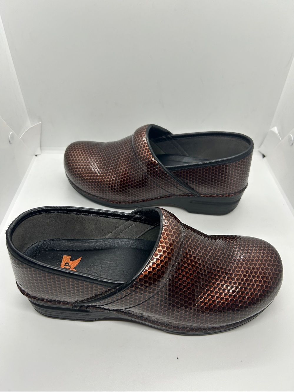 Dansko Brown Metallic Hex-Pattern Clogs - Picture 2 of 16